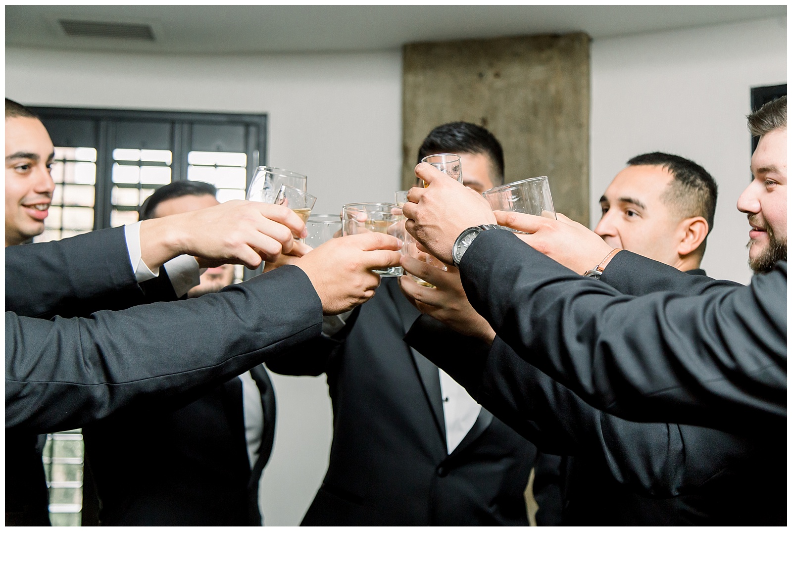Groomsmen toasting a drink to the groomfor A San Fernando Cathedral Wedding in San Antonio, TX | Monica Roberts Photography | www.monicaroberts.com | San Antonio Wedding Photographer