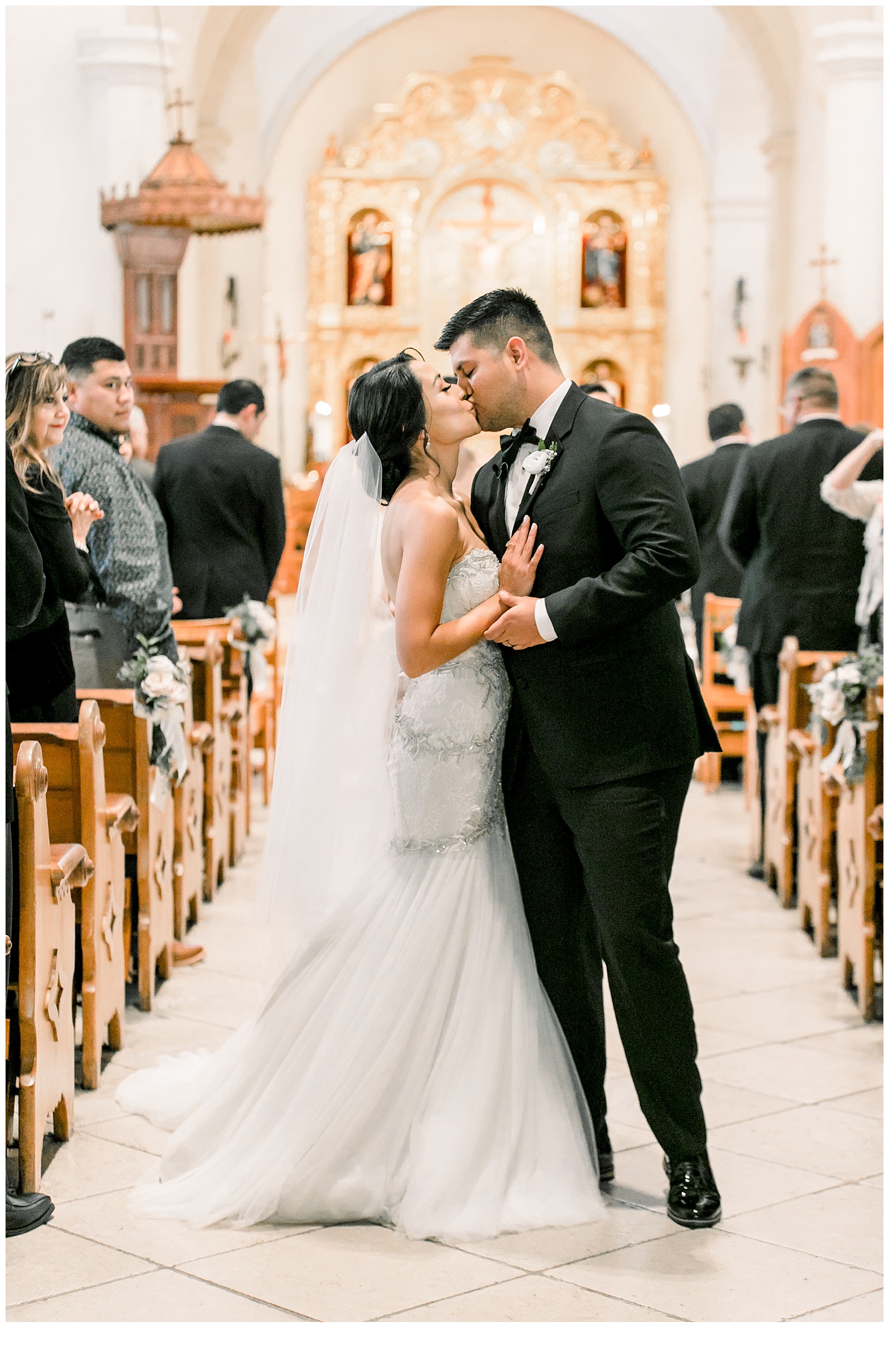 Couple kissing as they walk down the aisle for A San Fernando Cathedral Wedding in San Antonio, TX | Monica Roberts Photography | www.monicaroberts.com | San Antonio Wedding Photographer