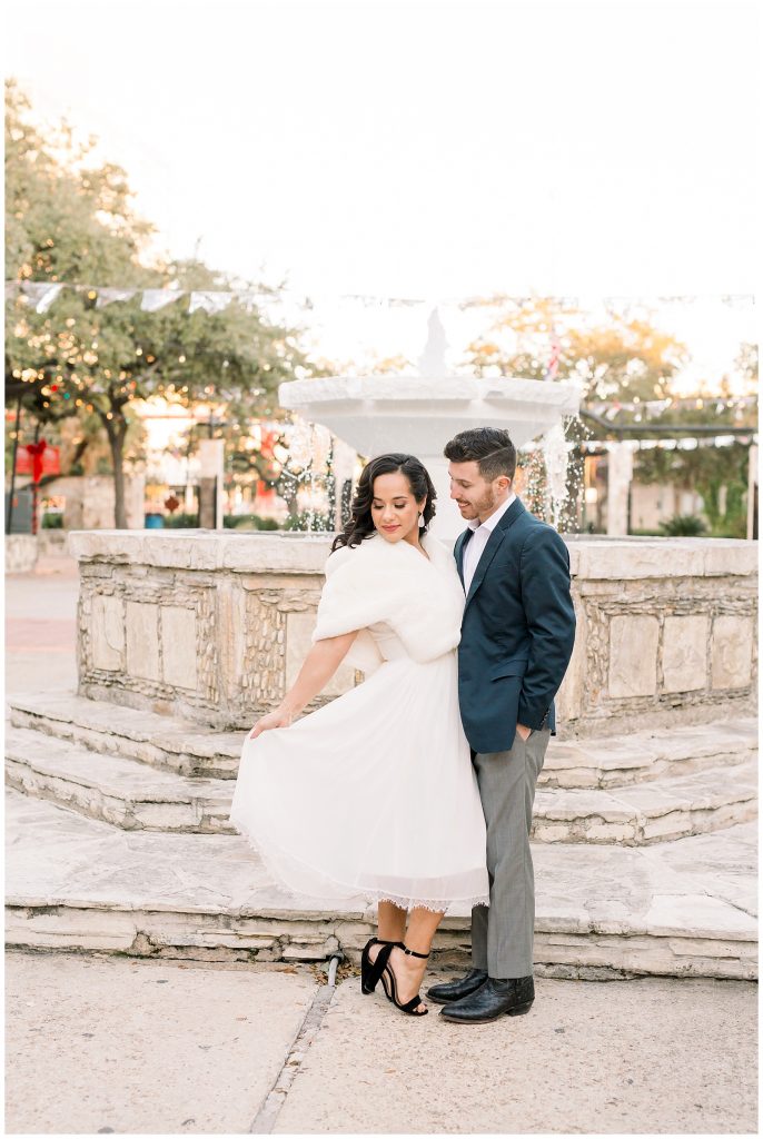 waterfall with a couple in front for a Gorgeous Downtown San Antonio Engagement Session with Monica Roberts Photography