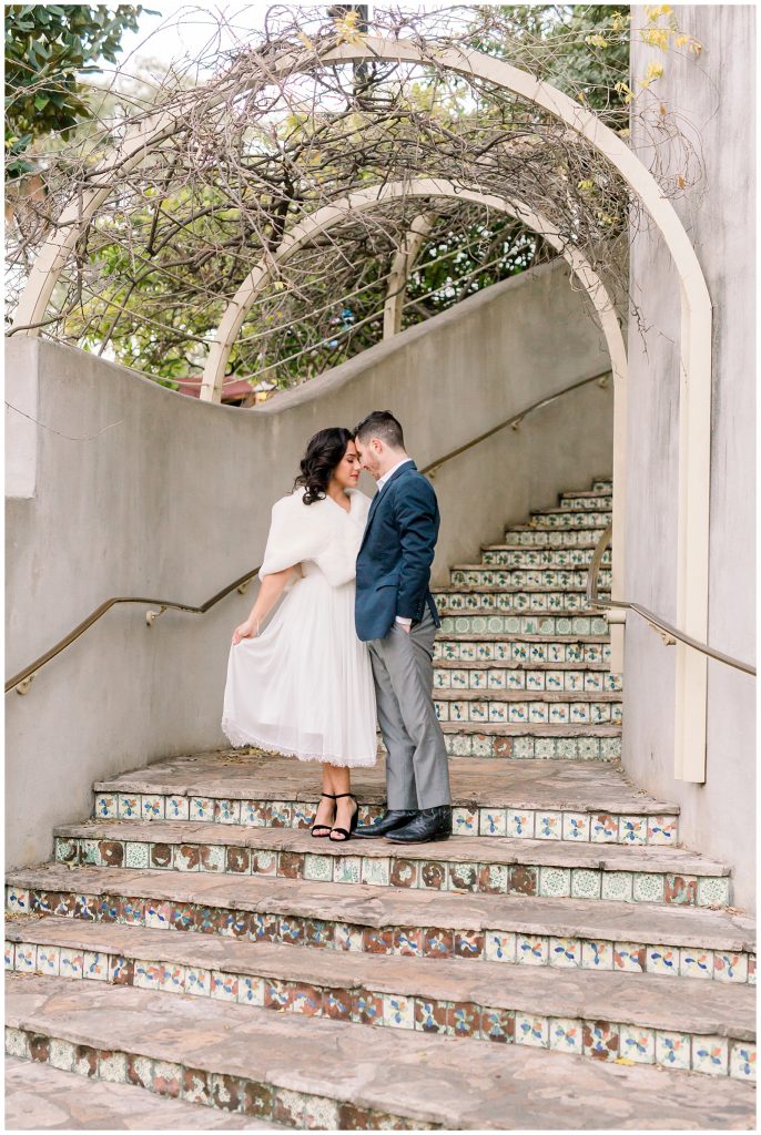 bride playing with her dress for a Gorgeous Downtown San Antonio Engagement Session with Monica Roberts Photography