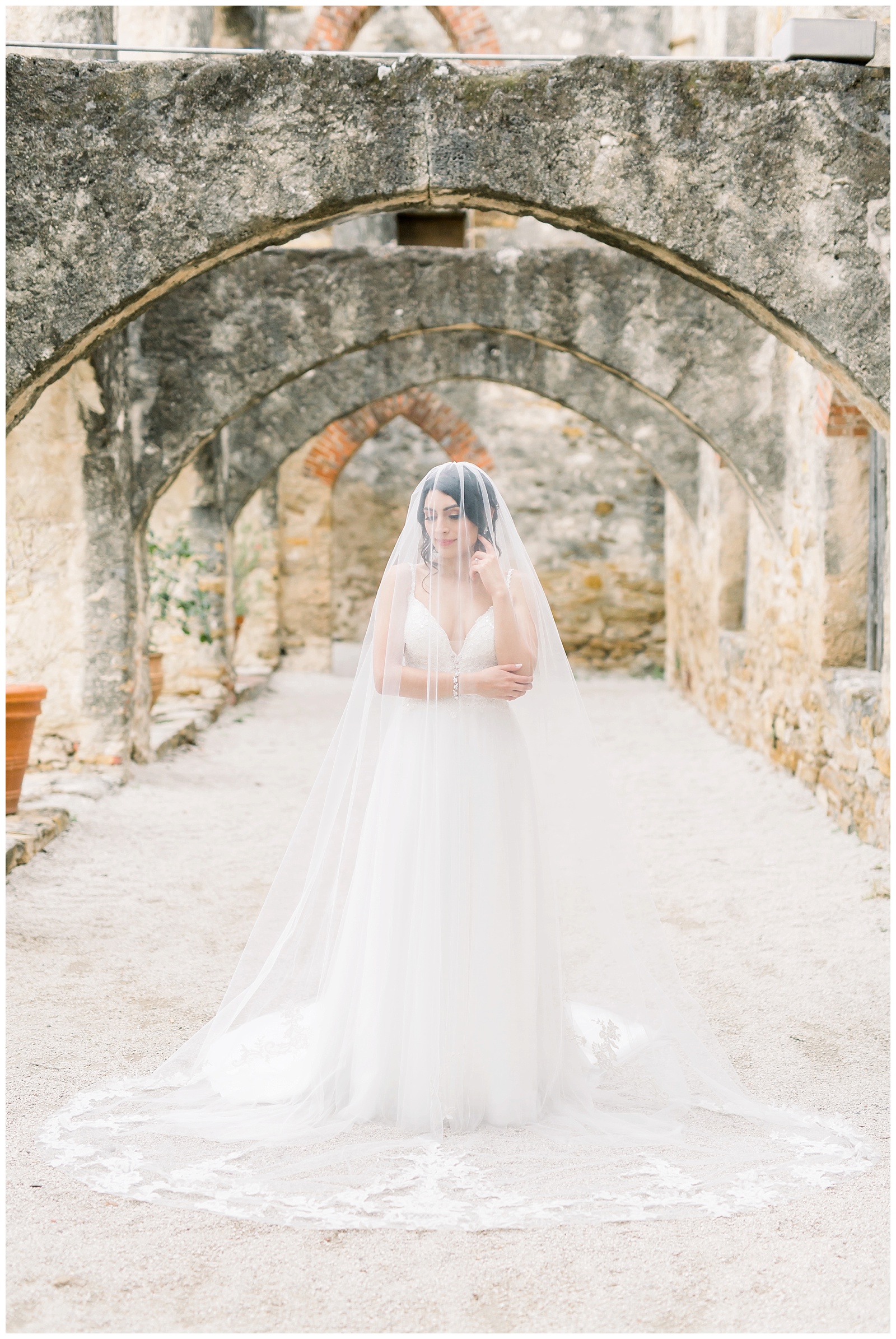 Gorgeous bride with romantic wedding dress for her Spanish Missions Bridal Portraits in San Antonio, TX with Monica Roberts Photography | www.monicaroberts.com