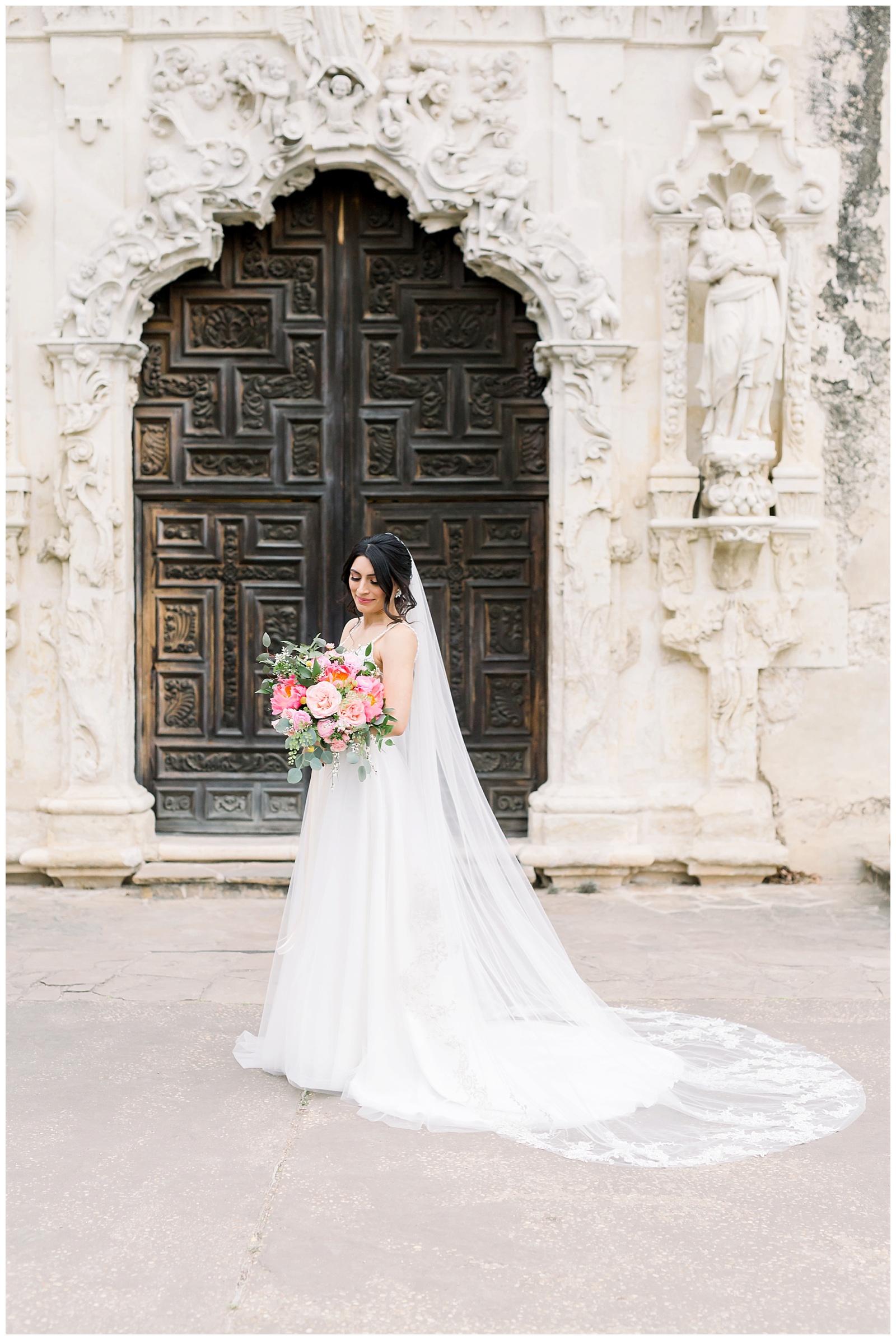Bride standing in front of doors for her Spanish Missions Bridal Portraits in San Antonio, TX with Monica Roberts Photography | www.monicaroberts.com