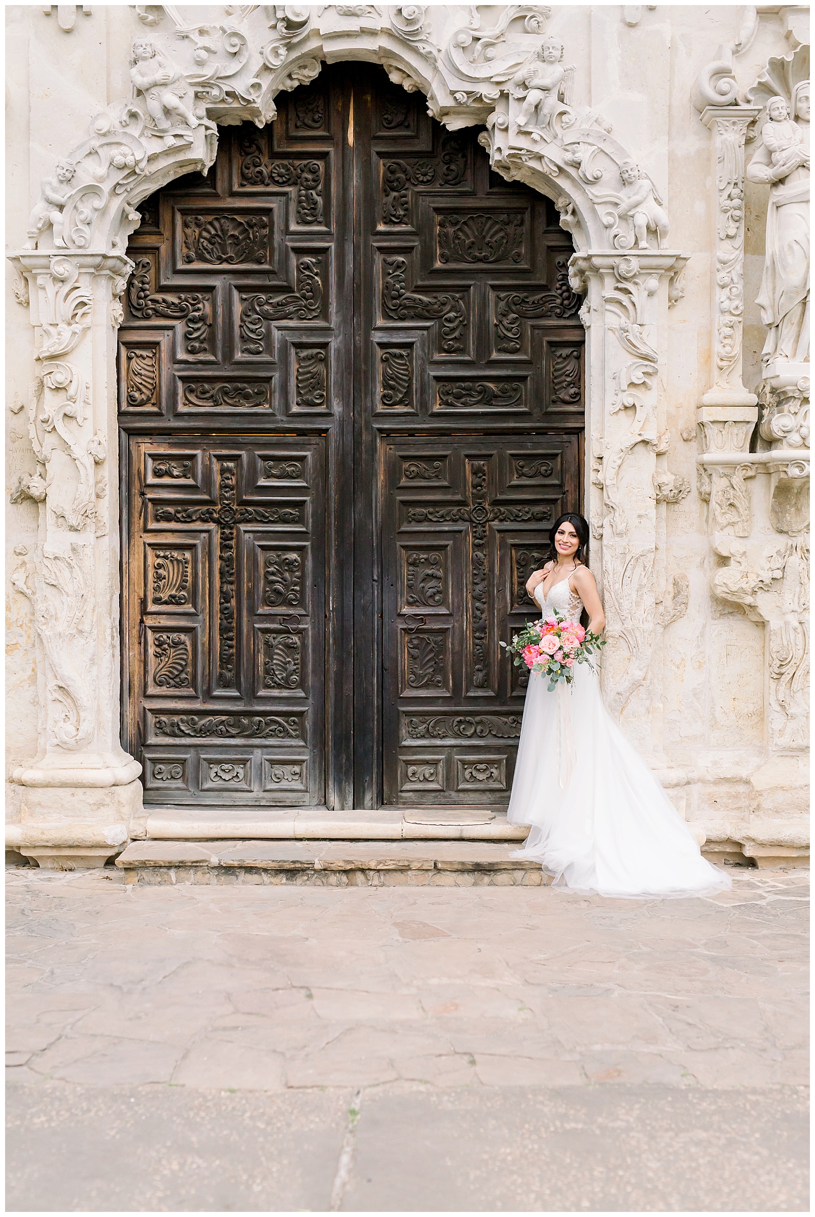 Bride in front of spanish missions doors for her Spanish Missions Bridal Portraits in San Antonio, TX with Monica Roberts Photography | www.monicaroberts.com