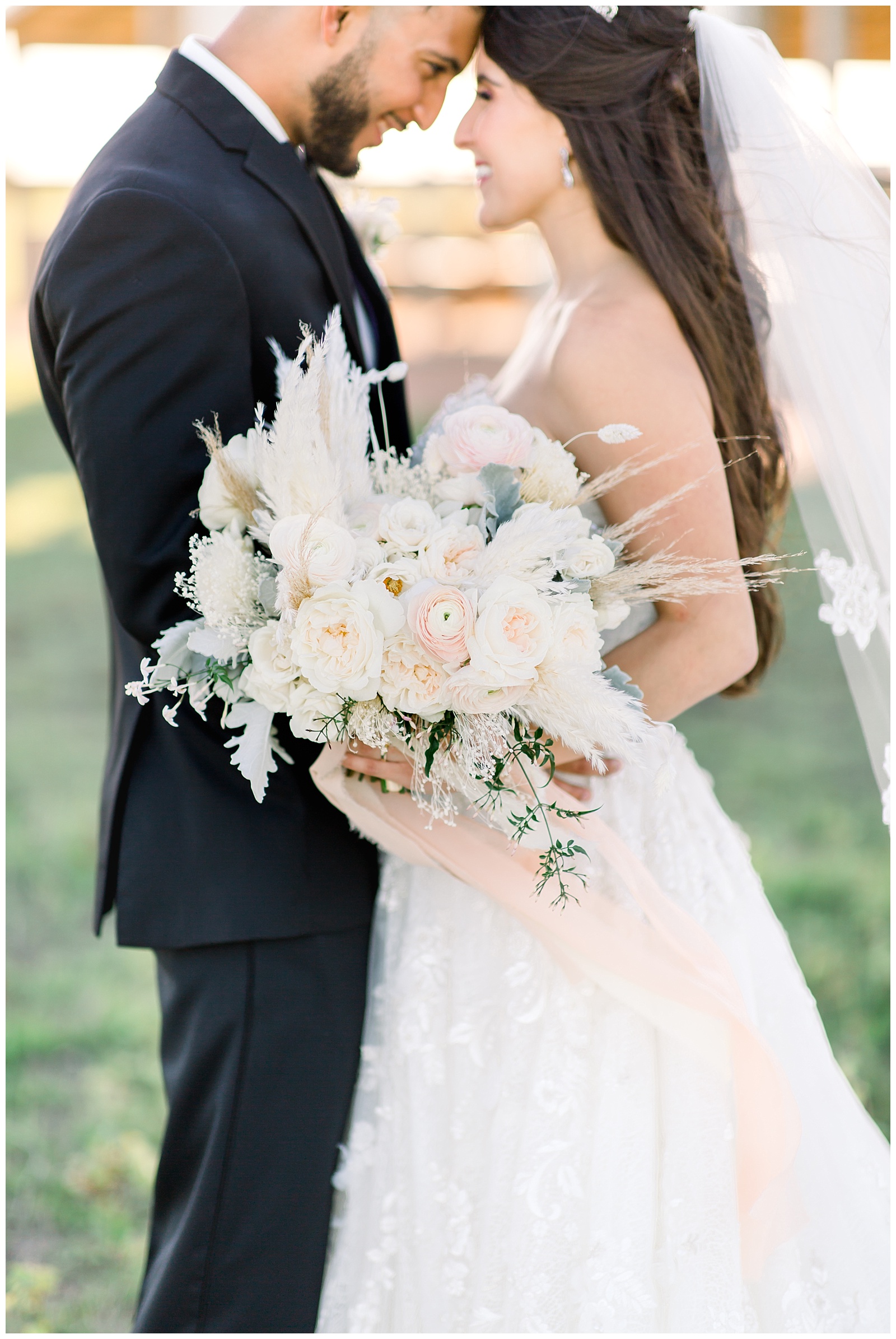 Bride and groom both hold gorgeous wedding bouquet for a Romantic Wedding at The Allen Farmhaus in New Braunfels, TX | San Antonio-Maui-Destination Wedding Photographer | Monica Roberts Photography | www.monicaroberts.com