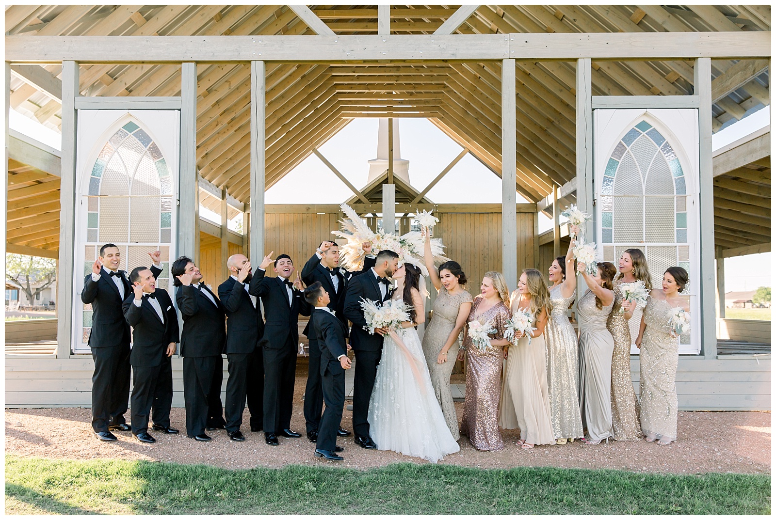 Bridal party celebrating in front of the alter at The Allen Farmhaus Wedding, TX by San Antonio-Maui-Destination Wedding Photographer | Monica Roberts Photography | www.monicaroberts.com