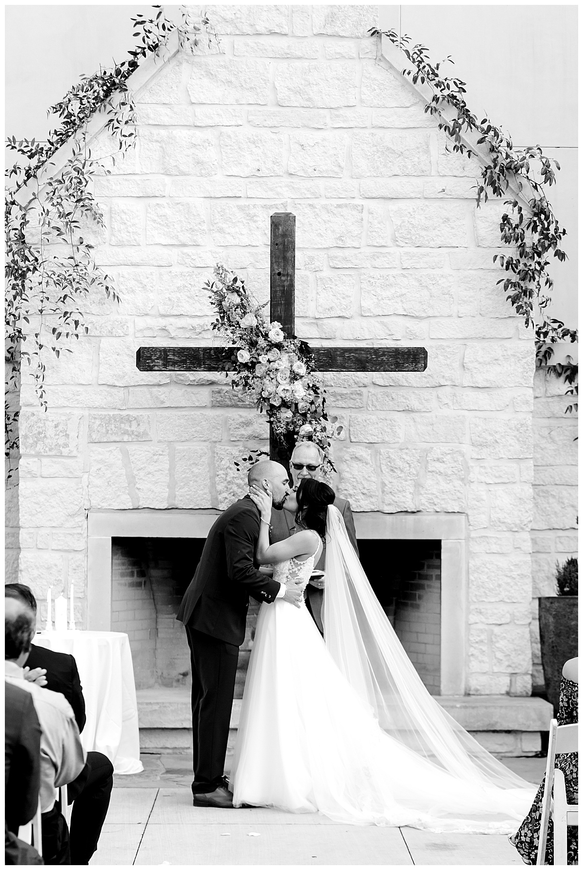 Black and white shot of bride and groom's first kiss at Hyatt Regency Hill Country Resort Wedding in San Antonio, TX | San Antonio Wedding photographer| Destination Wedding Photographer| Monica Roberts Photography | monicaroberts.com