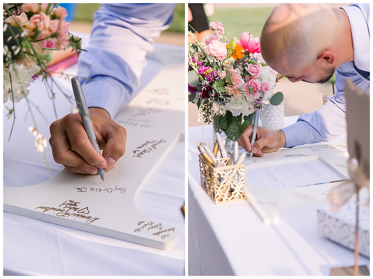 Letter 'H' for guests to sign being signed by groom at Hyatt Regency Hill Country Resort Wedding in San Antonio, TX | San Antonio Wedding photographer| Destination Wedding Photographer| Monica Roberts Photography | monicaroberts.com