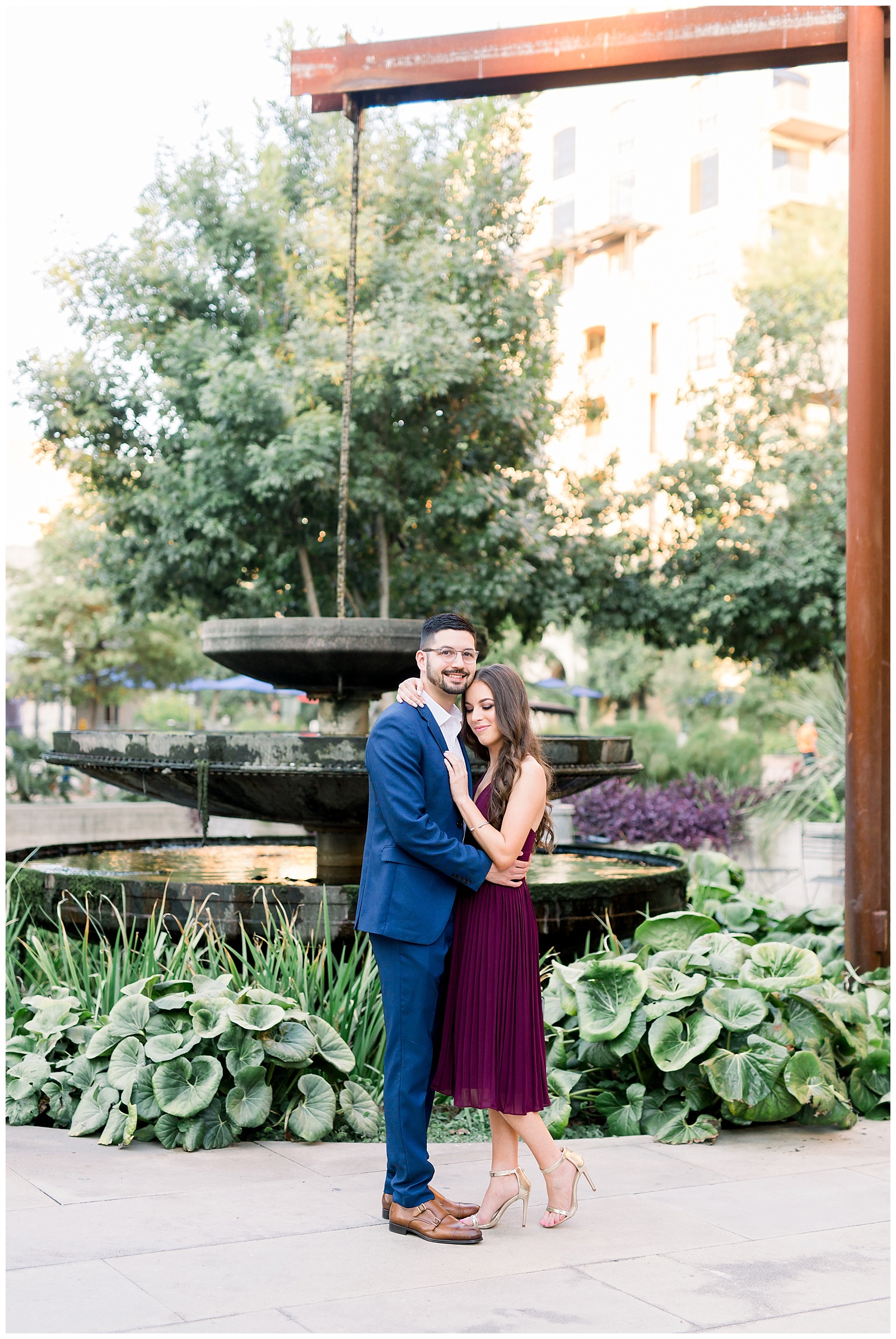 Couple snuggling at their Hotel Emma Engagement session in San Antonio, TX with Monica Roberts Photography | www.monicaroberts.com