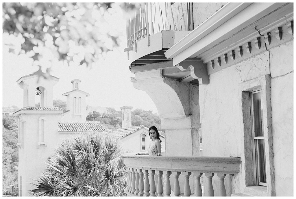Black and white of bride looking over terrace at Villa Antonia| villa bride| villa wedding| Austin, TX wedding photographer| www.monicaroberts.com