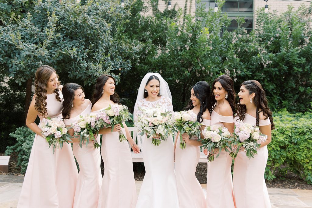 bridesmaids laughing for a wedding at the Jack Guenther Pavilion at the Briscoe in San Antonio with Monica Roberts Photography - https://monicaroberts.com/