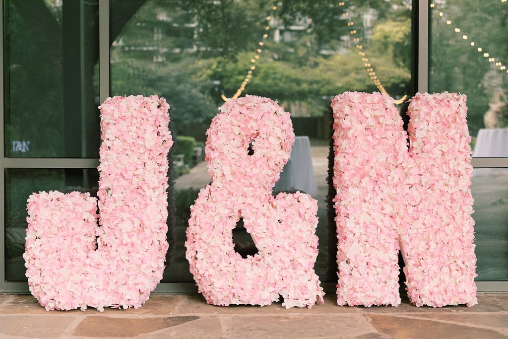 floral letter details for a wedding at the Jack Guenther Pavilion at the Briscoe in San Antonio with Monica Roberts Photography - https://monicaroberts.com/