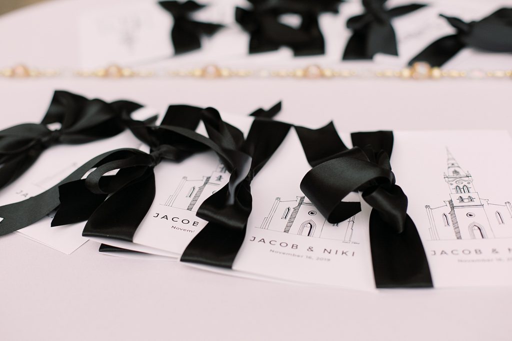white and black wedding program details for a wedding at the Jack Guenther Pavilion at the Briscoe in San Antonio with Monica Roberts Photography - https://monicaroberts.com/