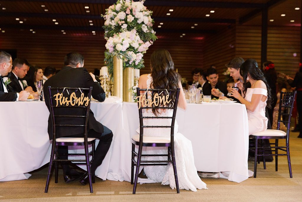 his only and her one chair signs for wedding reception for a wedding at the Jack Guenther Pavilion at the Briscoe in San Antonio with Monica Roberts Photography - https://monicaroberts.com/