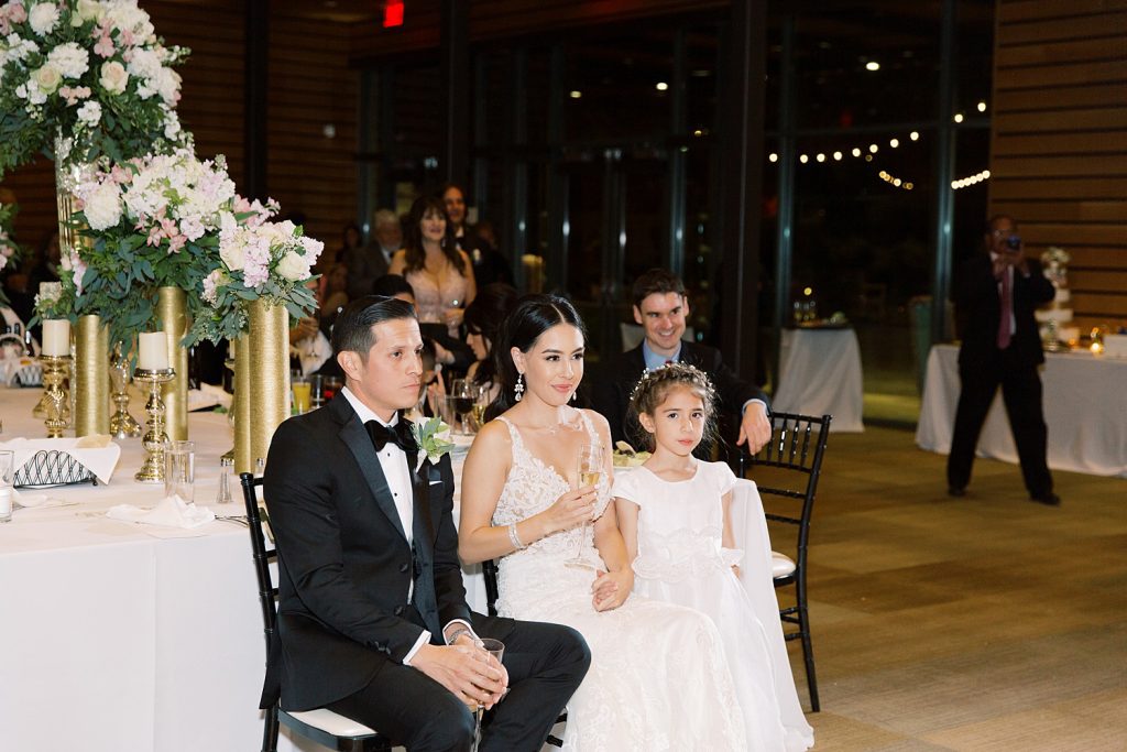 bride and groom sitting together for a wedding at the Jack Guenther Pavilion at the Briscoe in San Antonio with Monica Roberts Photography - https://monicaroberts.com/