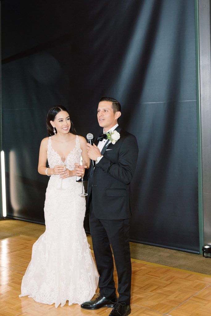 bride and groom give thank you speech for a wedding at the Jack Guenther Pavilion at the Briscoe in San Antonio with Monica Roberts Photography - https://monicaroberts.com/
