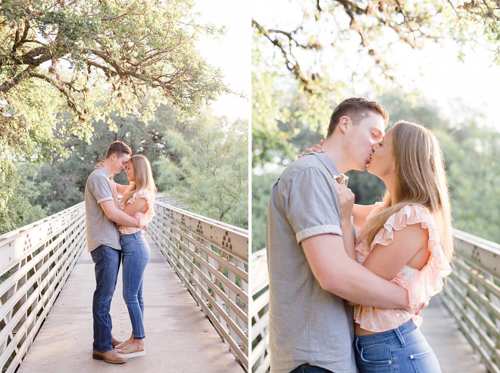 Couple Kissing on a Bridge in Downtown San Antonio for their engagement session with Monica Roberts Photography https://monicaroberts.com