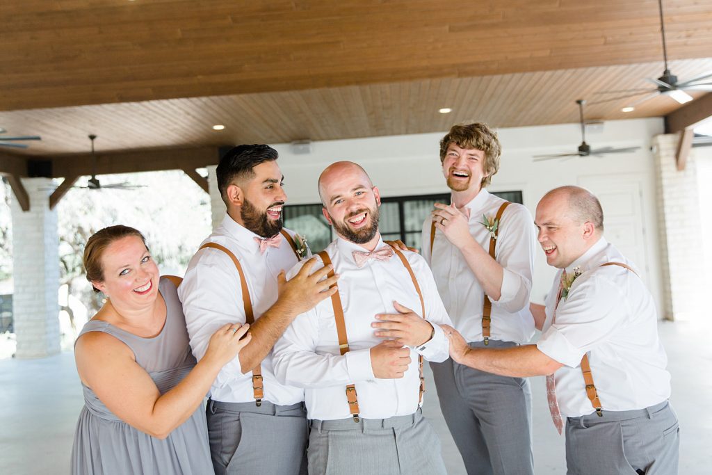 Groom with his bridal party for a Romantic dusty rose wedding at Hayes Hollow with Monica Roberts Photography https://monicaroberts.com/