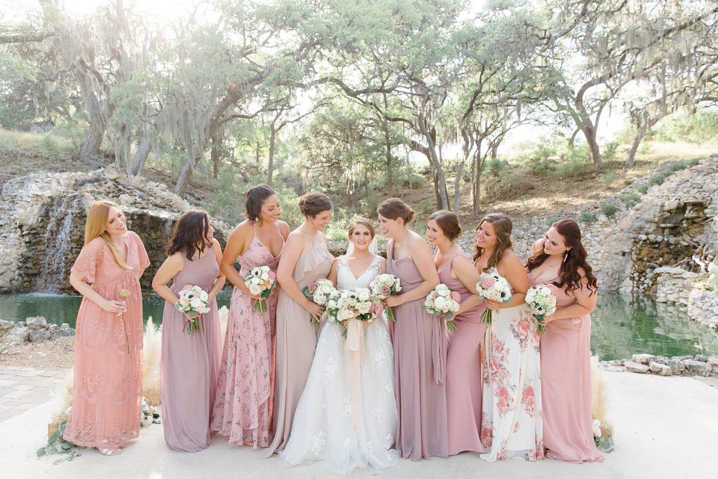 Bride with her bridesmaids for a Romantic dusty rose wedding at Hayes Hollow with Monica Roberts Photography https://monicaroberts.com/