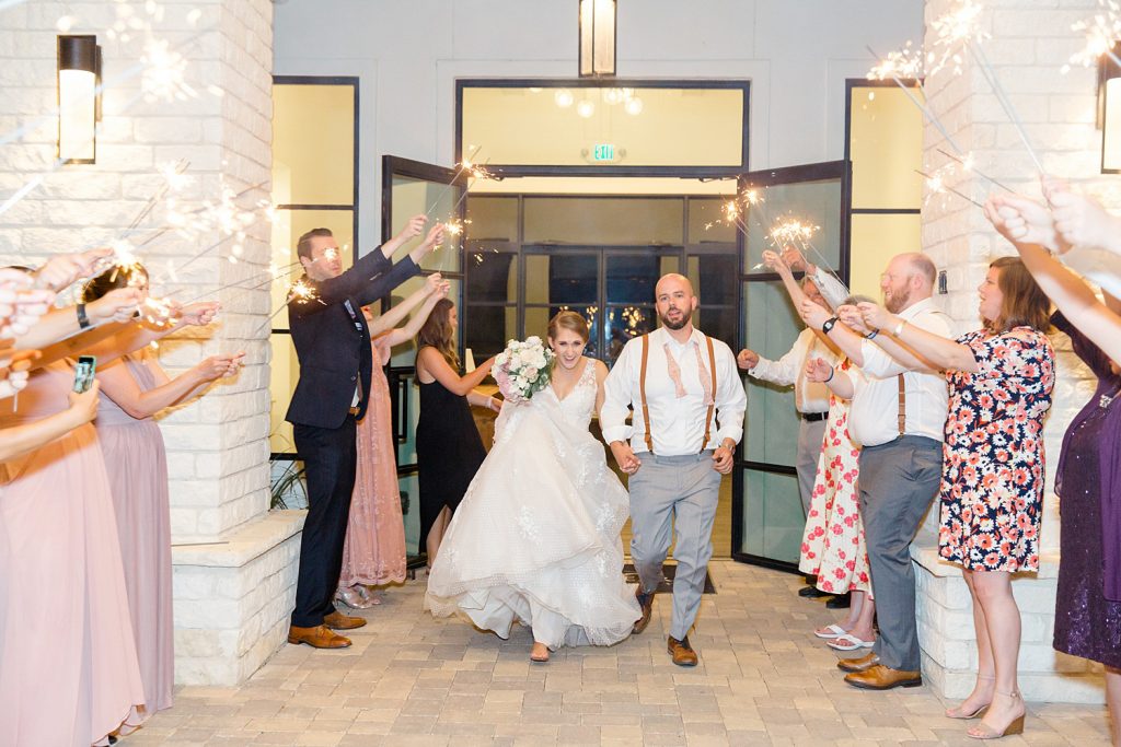grand sparkler exit for a Romantic dusty rose wedding at Hayes Hollow with Monica Roberts Photography https://monicaroberts.com/