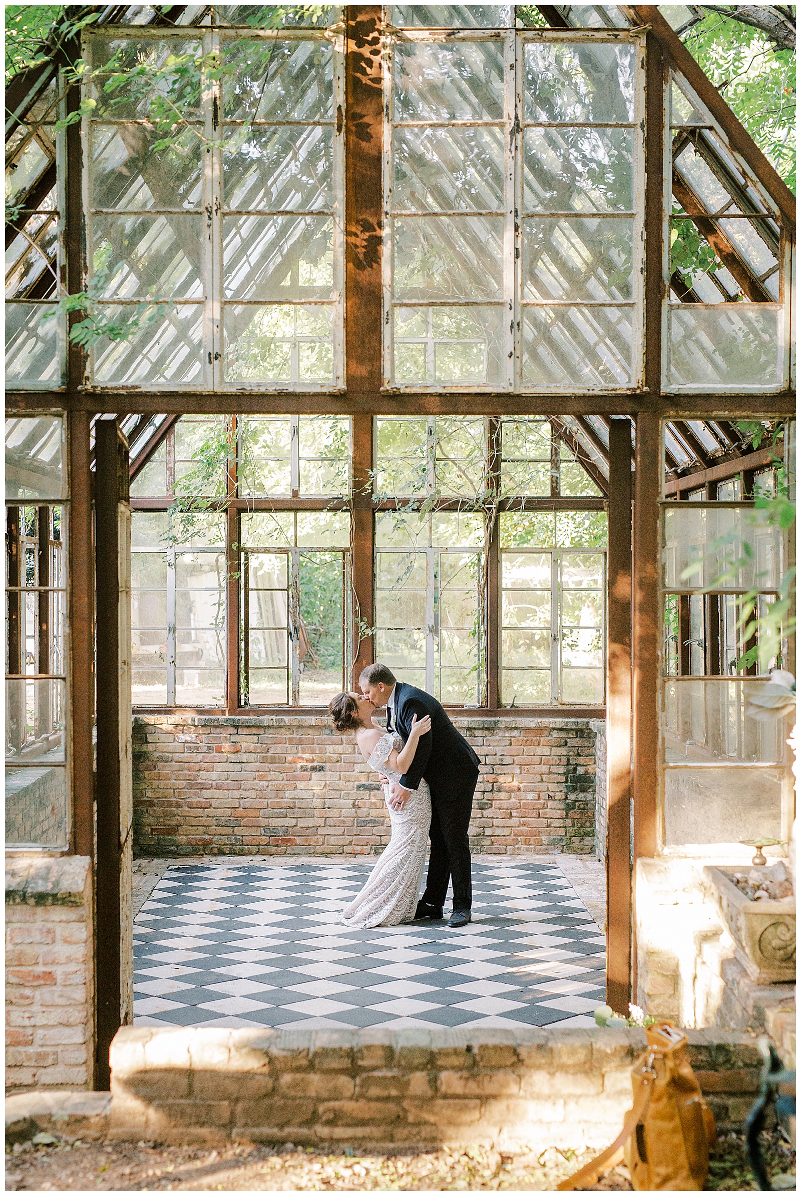 Couple dip and kiss while in a beautiful greenhouse for their downtown washington d.c wedding by Monica Roberts Photography monicaroberts.com