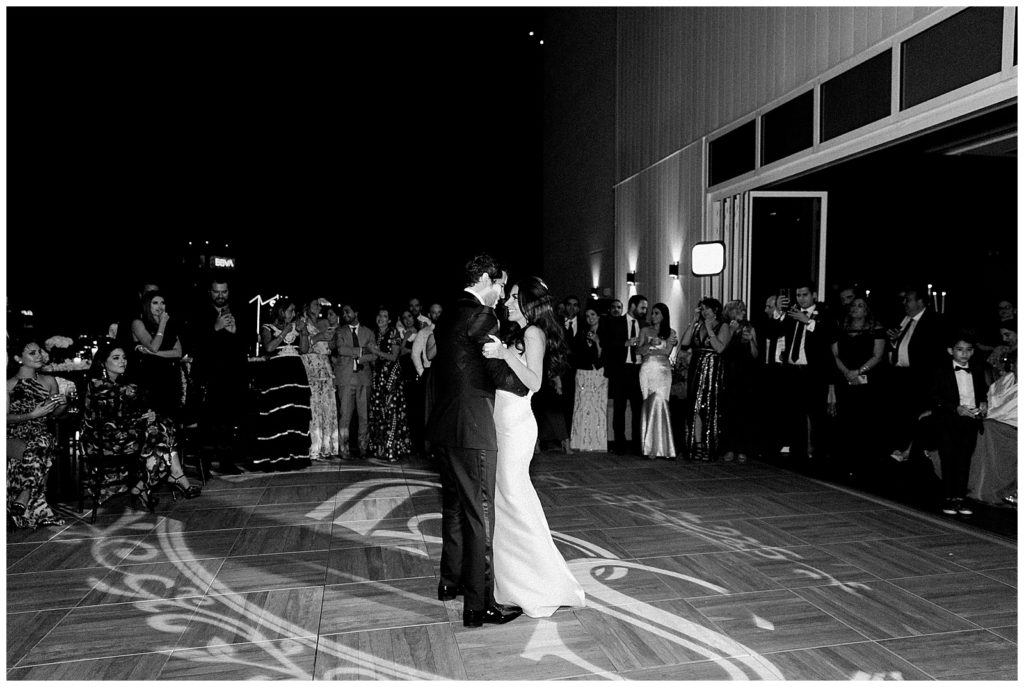 black and white image of couple sharing their first dance for a romantic wedding at the Thompson Hotel in Richmond Virginia with Monica Roberts Photography monicaroberts.com 