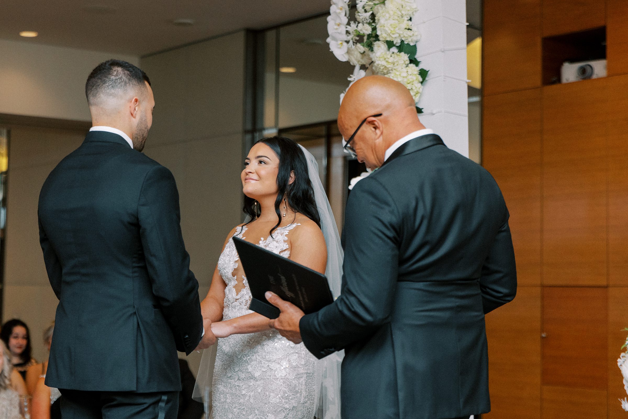 Bride and Groom Exchanging Vows at Four Seasons Baltimore